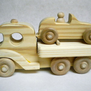 Flat bed with car.